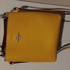 Like new gold Coach bag